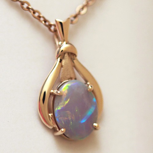 14k Yellow Gold Pendant with a SOLID SEMI BLACK OPAL From neon orange to beautiful blue